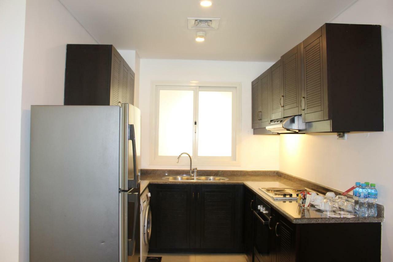 Mövenpick Hotel&Resort Al Bida'a Kuwait Salmiya Exterior foto A typical kitchen in a residential apartment