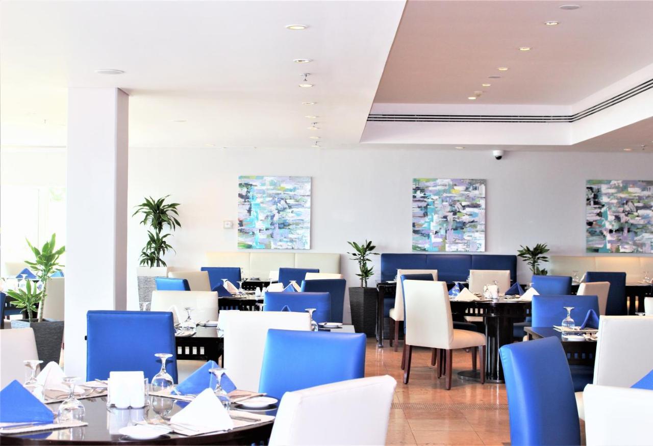 Mövenpick Hotel&Resort Al Bida'a Kuwait Salmiya Exterior foto The restaurant